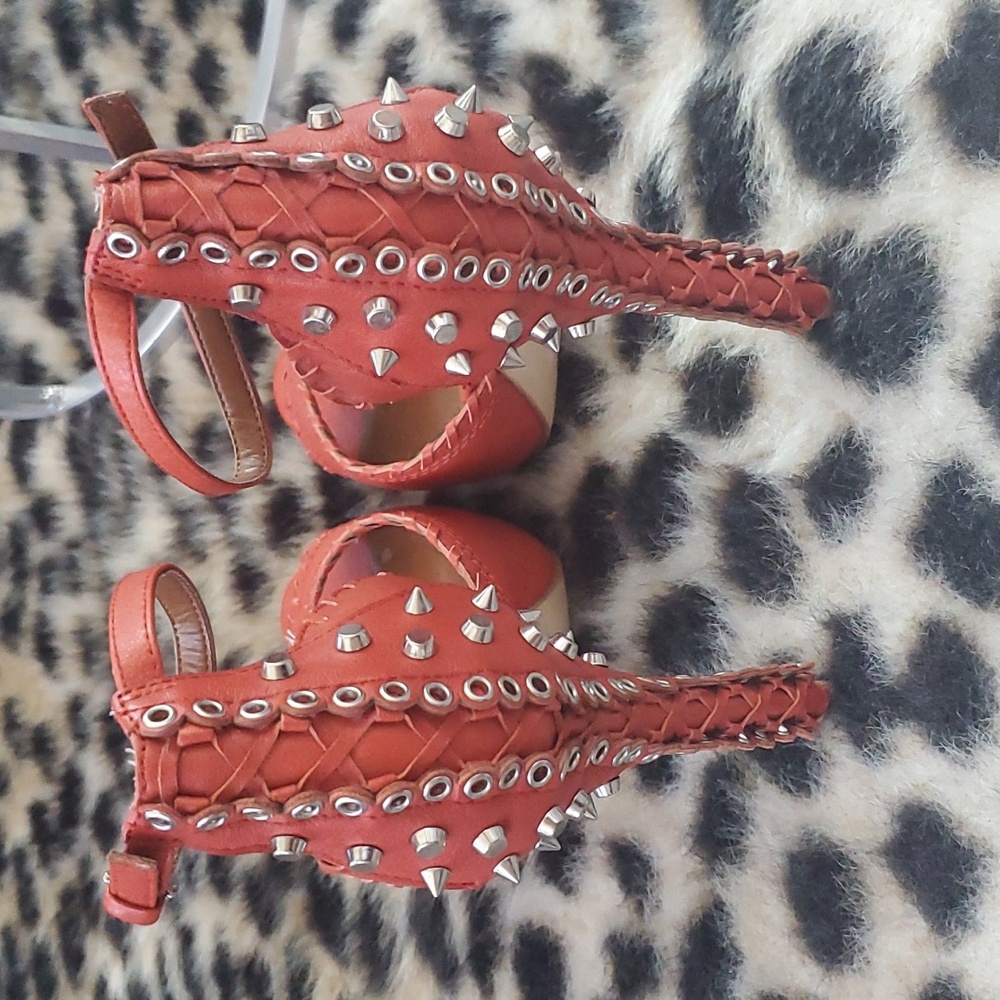 Leather stud embellished heels